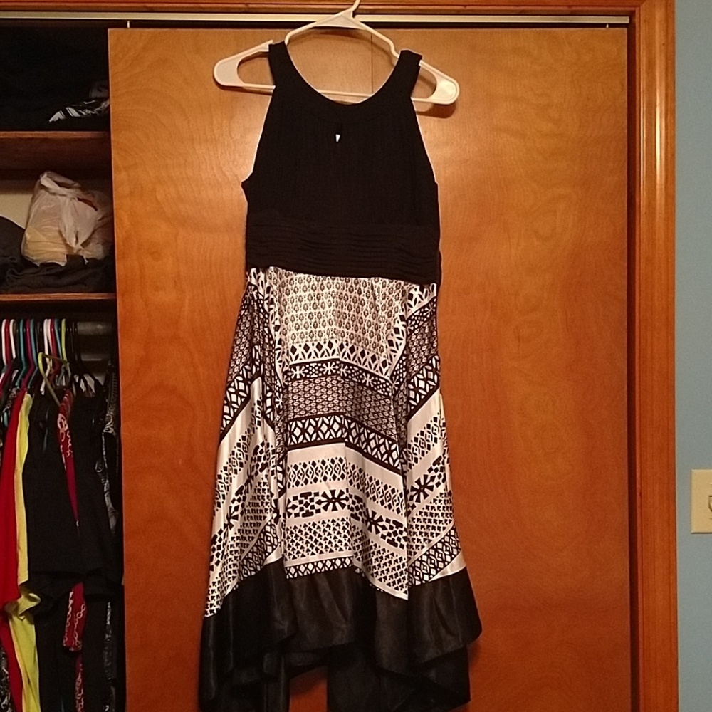 Dress with silk fabric handkerchief cut bottom.